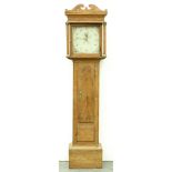 An English pine thirty hour longcase clock, early 19th c, the dial pierced with date sector and