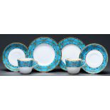 A pair of Mintons bone china Aesthetic cups, saucers and plates, the design attributed to Dr