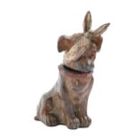 A cold painted spelter miniature model of a dog with nodding head, early 20th c, 10cm h Paint
