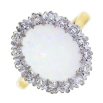 An opal and diamond cluster ring, in gold marked 18ct, 6.4g, size N Good condition