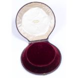Carlo Giuliano. A Victorian round maroon morocco covered necklace box, lined in maroon plush, the
