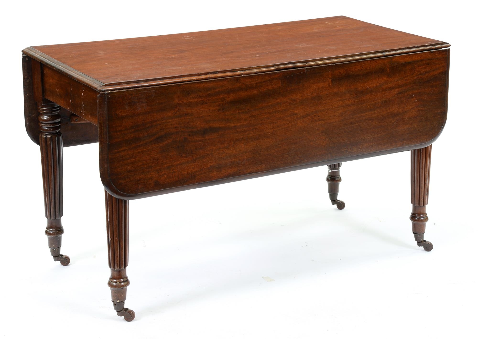 A Victorian mahogany drop leaf table, on reeded tapering turned legs and pottery castors, 72cm h;