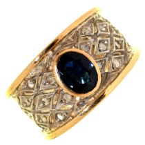 A sapphire and diamond band ring, in two colour gold, 8.5g, size Q Slight scratches from wear