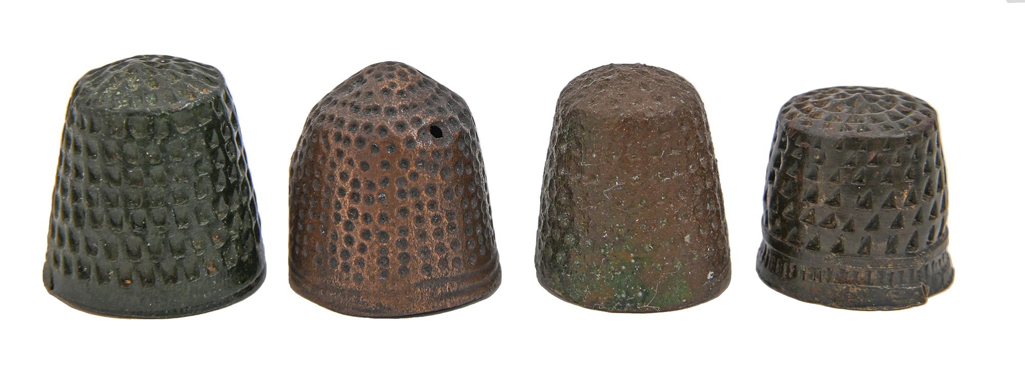 Four European brass thimbles, 15th-17th c, 21mm h and smaller Minor dents but in acceptable/good