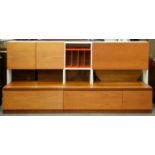 Two teak and laminate modular wall units, 1960s,  134cm h, overall length 254cm One or two minor