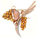 A citrine and diamond spray brooch, mid 20th c, in gold, 55mm, apparently unmarked, 12.4g Good