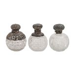 One George V and two Victorian silver mounted cut glass scent bottles, with silver cap and stopper