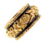 An 18ct gold and black enamel mourning ring, with concealed compartment, the band chased in high