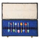 A  harlequin set of nine Norwegian silver gilt and Harlequin guilloche enamel coffee spoons,