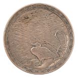A Japanese miniature silver dish, Meiji period, chased and engraved with a bird at the water margin,