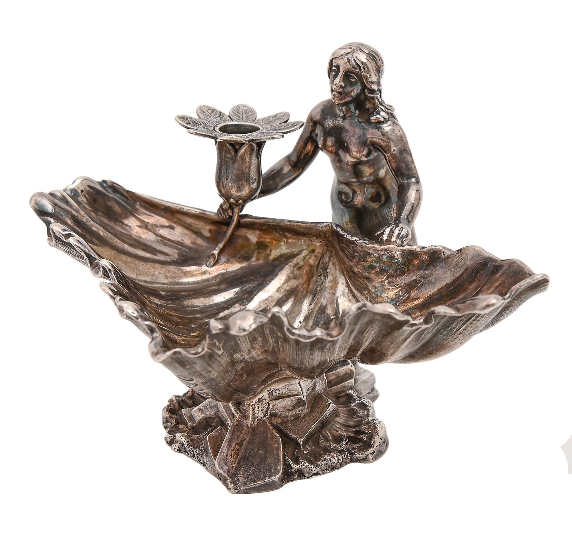 A Victorian cast silver figural mermaid-and-shell taperstick,  with flower shaped nozzle, 85mm h, by