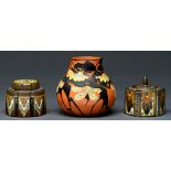 Two Gouda art pottery inkwells and covers and a contemporary Swiss art nouveau earthenware vase of