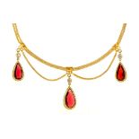 A diamond and tear shaped garnet festoon necklace, 19th c, in gold, 41cm l, 13.7g Good condition