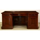 A Victorian stained oak pedestal sideboard,  with carved  handles and panelled doors, 94cm h; 70 x