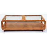 An Ercol ash coffee table, with plate glass top, 40cm h; 68 x 140cm Good condition for age