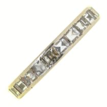 A diamond eternity ring, platinum coloured metal mount, 3.9g, size L½ Much encrusted with dirt, wear