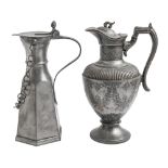 A Victorian Britannia metal lidded jug, 27cm h and a pewter flagon (2)