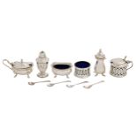 An Elizabeth Ii gadrooned silver condiment set, blue glass liners, pepperette 75mm h, by J B