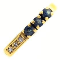 A sapphire and diamond ring, illusion set in gold marked 18ct, 2.9g, size O