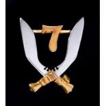 7th Gurkha Rifles. A two colour 9ct gold sweetheart brooches, 25mm, by Garrard & Co Ltd,