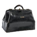 A good quality black leather bag, lettered in gilt T. H. M., 46cm l