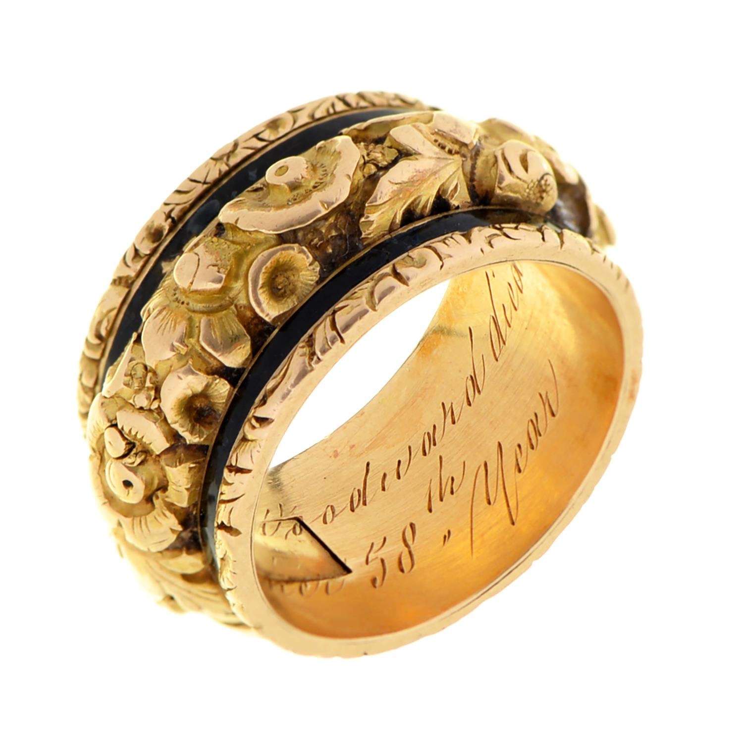 An 18ct gold and black enamel mourning ring, with concealed compartment, the band chased in high - Image 2 of 2