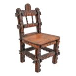 A Victorian tramp work chip carved and stained softwood miniature chair, 33cm h Good condition
