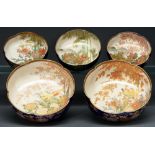Five Japanese Satsuma bowls, 20th c,  with five lobe rim, enamelled and gilt with pheasants or