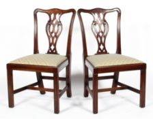 A pair of George III style mahogany dining chairs, 20th century,