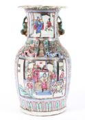 A late 19th/early 20th century Chinese famille rose baluster vase with flared rim,