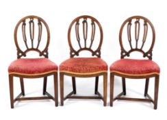 Three 19th century upholstered dining chairs,