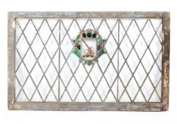 A late Victorian stained glass armorial window panel,