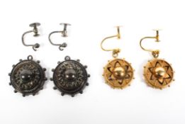 A pair of 9ct gold Etruscan style circular clip earrings together with similar white metal examples,