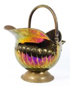 A Victorian brass coal scuttle,