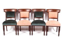 A set of four William IV mahogany bar back dining chairs, each with scroll ornament to bar,