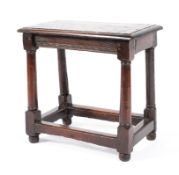 An 18th century oak joint stool,