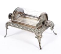 An Edwardian silver plated rotating butter dish, of rectangular form cast with gadroons,