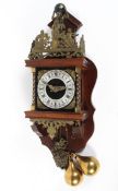 A Dutch brass and oak mounted wall clock, 20th century,