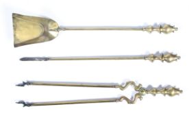 A set of Victorian brass fire companion set, comprising: a shovel, tongs and a poker,