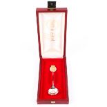 A sterling silver and gilt silver Elizabeth II Silver Jubilee commemorative spoon in red fitted box.