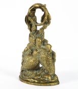 A 19th century brass door stop, cast with two partridges amongst scrolling foliage, height 29.