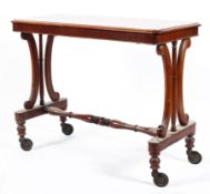 A Victorian mahogany side table, the moulded top above two double scroll and baluster supports,