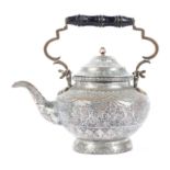 A white metal Persian teapot and cover, probably Iranian, late 19th/early 20th century,