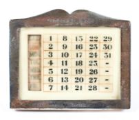 A George V silver mounted desk calendar of rectangular form,