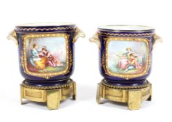 A pair of Sevres-style French porcelain gilt-metal mounted jardinieres, late 19th century,