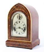 A German (Winterhalder & Hofmeier) chiming burr walnut mantle clock, early 20th century,