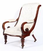 A Victorian mahogany framed library armchair,