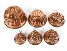 Six Victorian copper jelly moulds,