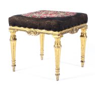 A 19th century giltwood footstool,