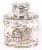 A Chinoiserie white metal oval tea caddy, 20th century,